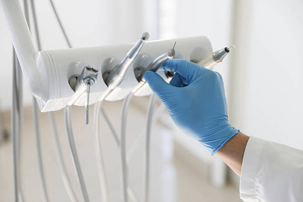 Professional Root Canal Treatment technician working in Big Rapids, MI